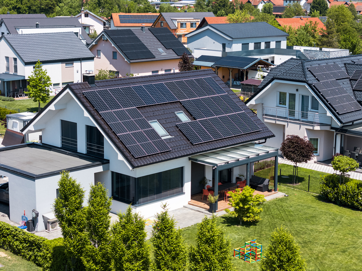 Modern Houses with Solar Panels in a Suburban Neighborhood